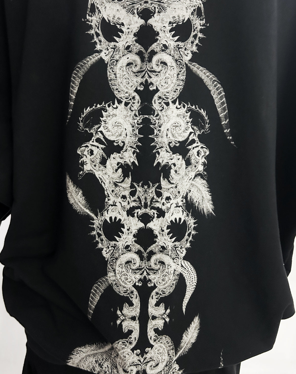 2502-TP12 Magnolia Feather Dolman Top_Black