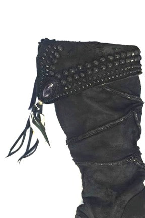 Additional small stone with leather fringe and feathers