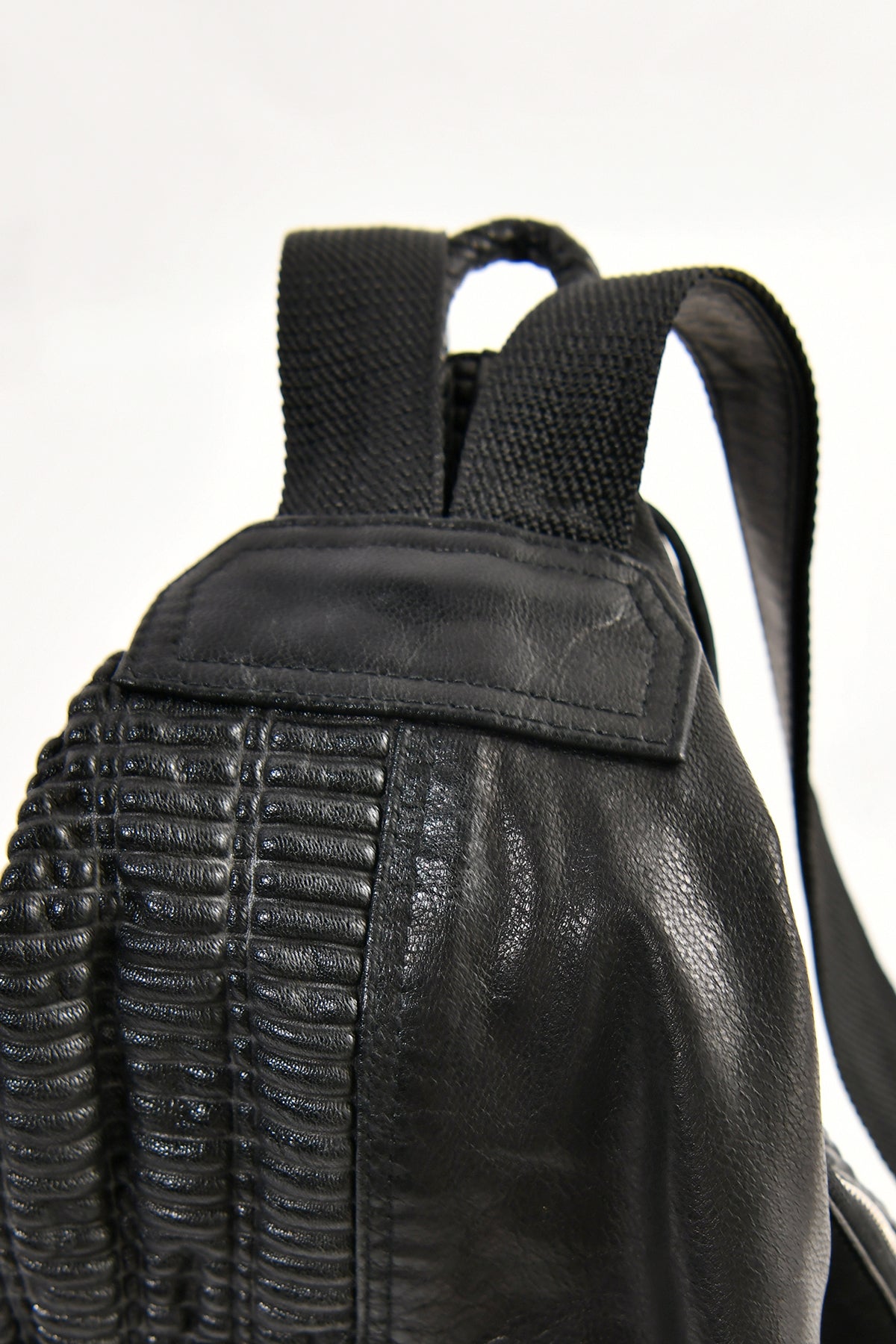 2102-BG01 Bismuth Triangle Backpack